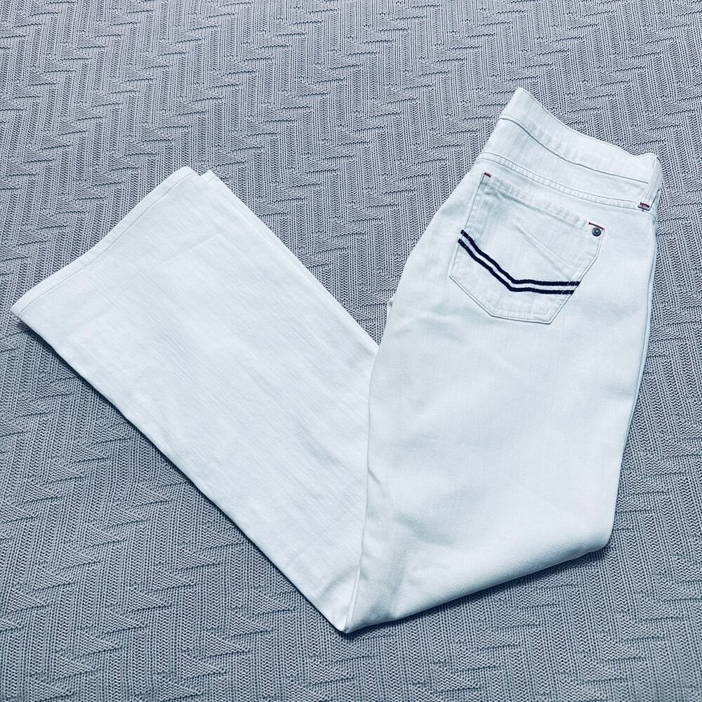 James cured by Seun white flared jeans